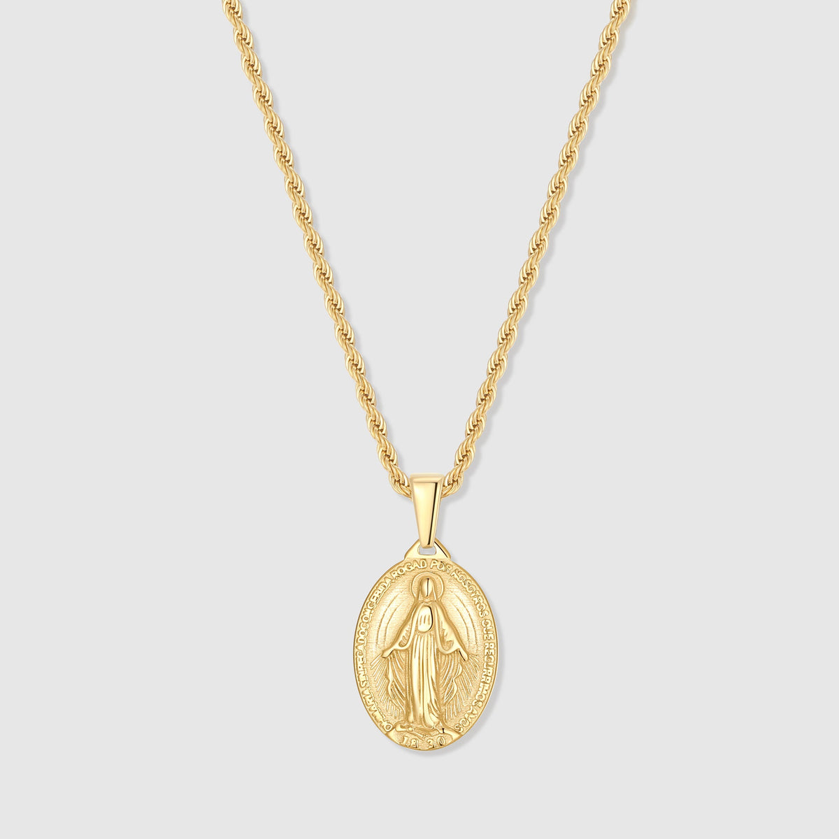 Gold Saint Mary oval pendant necklace on chain, close-up view
