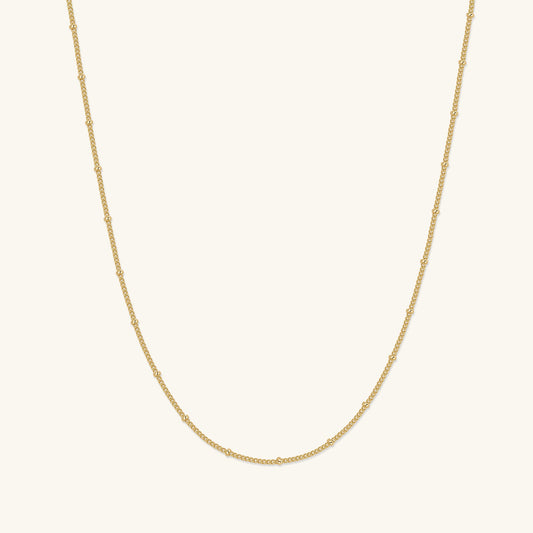 Gold chain choker necklace with fine linked texture