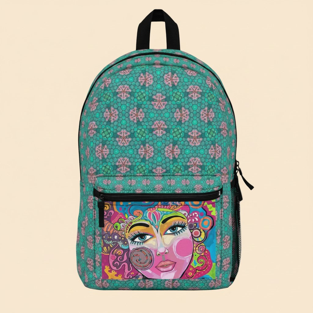 Teal patterned art backpack with black zipper pocket and colorful face front panel