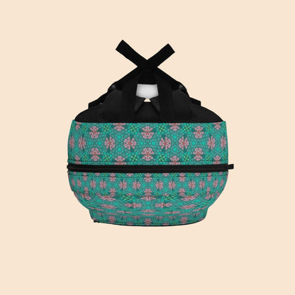 Teal patterned backpack with black top handle and bow-style closure