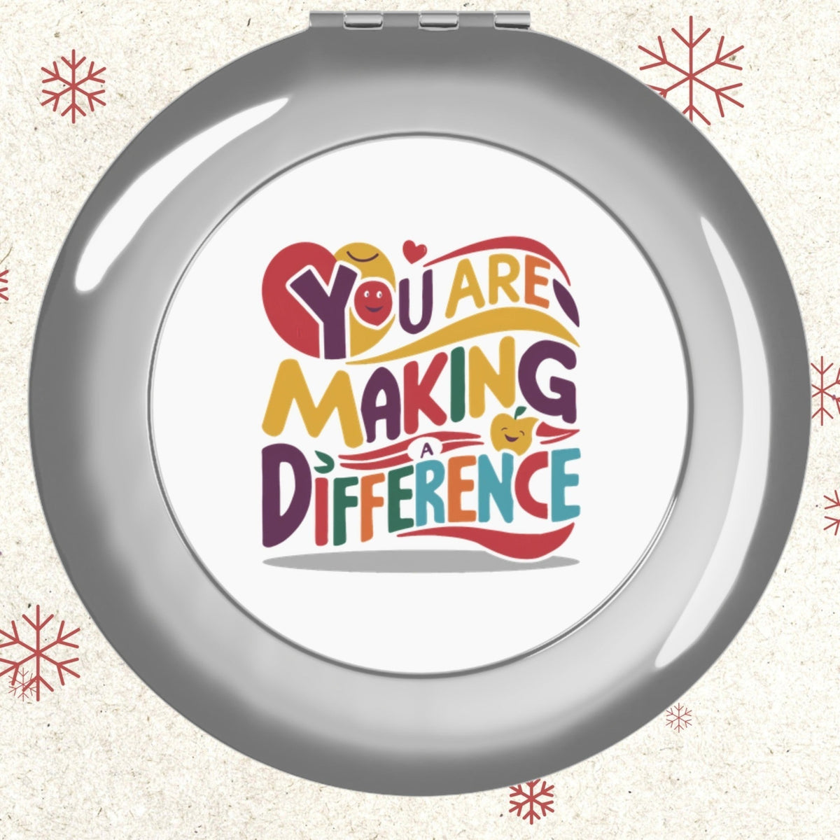 Silver glossy compact travel mirror with front face logo panel, round design