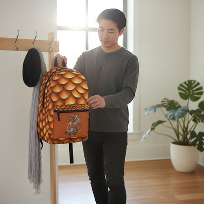 Dragon-scales backpack held up, showing front pocket and illustrated dragon
