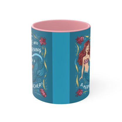 Blue accent mug with pink rim, featuring teal mermaid teaching graphic