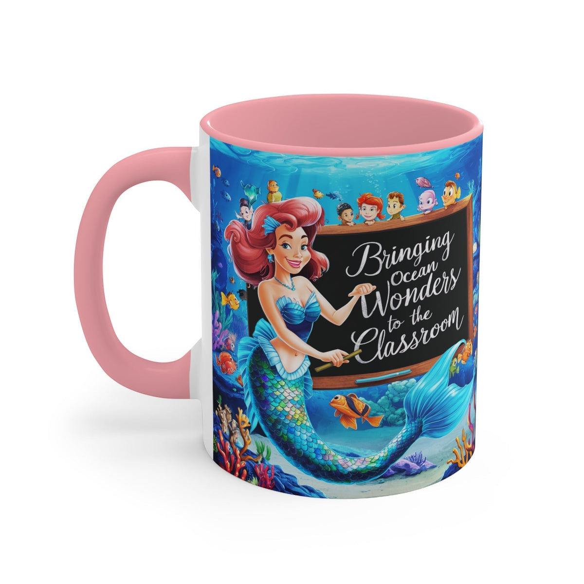 Pink ceramic accent mug with mermaid ocean classroom graphic, pink handle, white side panel