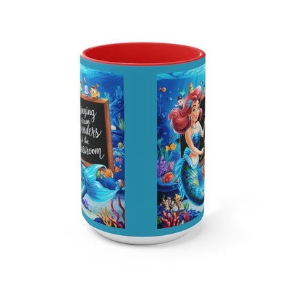 Ocean-themed accent mug with blue sides and red interior, featuring underwater character artwork