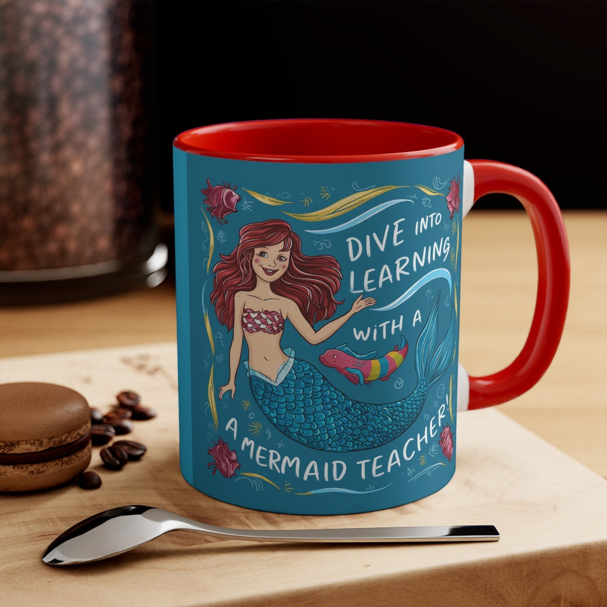 Red accent mug with teal mermaid artwork and "Mermaid Teacher" lettering