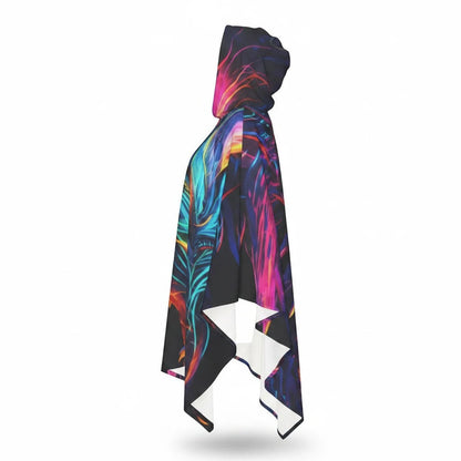 Three-quarter view of hooded neon dragon cape with draped sides and asymmetrical hem