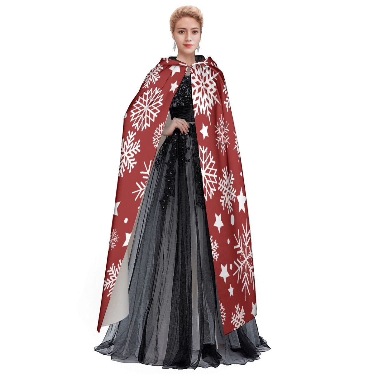 Red hooded cloak cape with white snowflake and star print, paired with black skirt