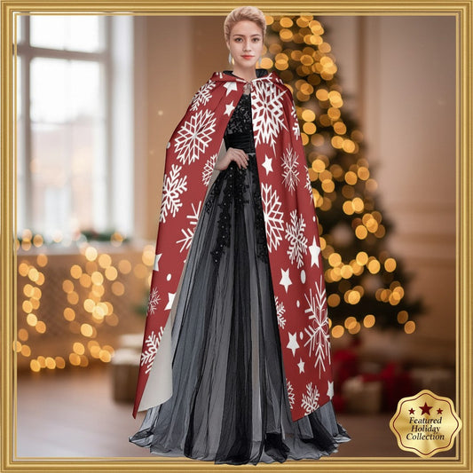 Red hooded cloak cape with white snowflake and star print, draped over black tulle skirt