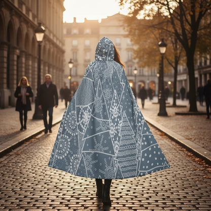 Hooded cloak with blue-gray geometric snowflake pattern, wide cape hem