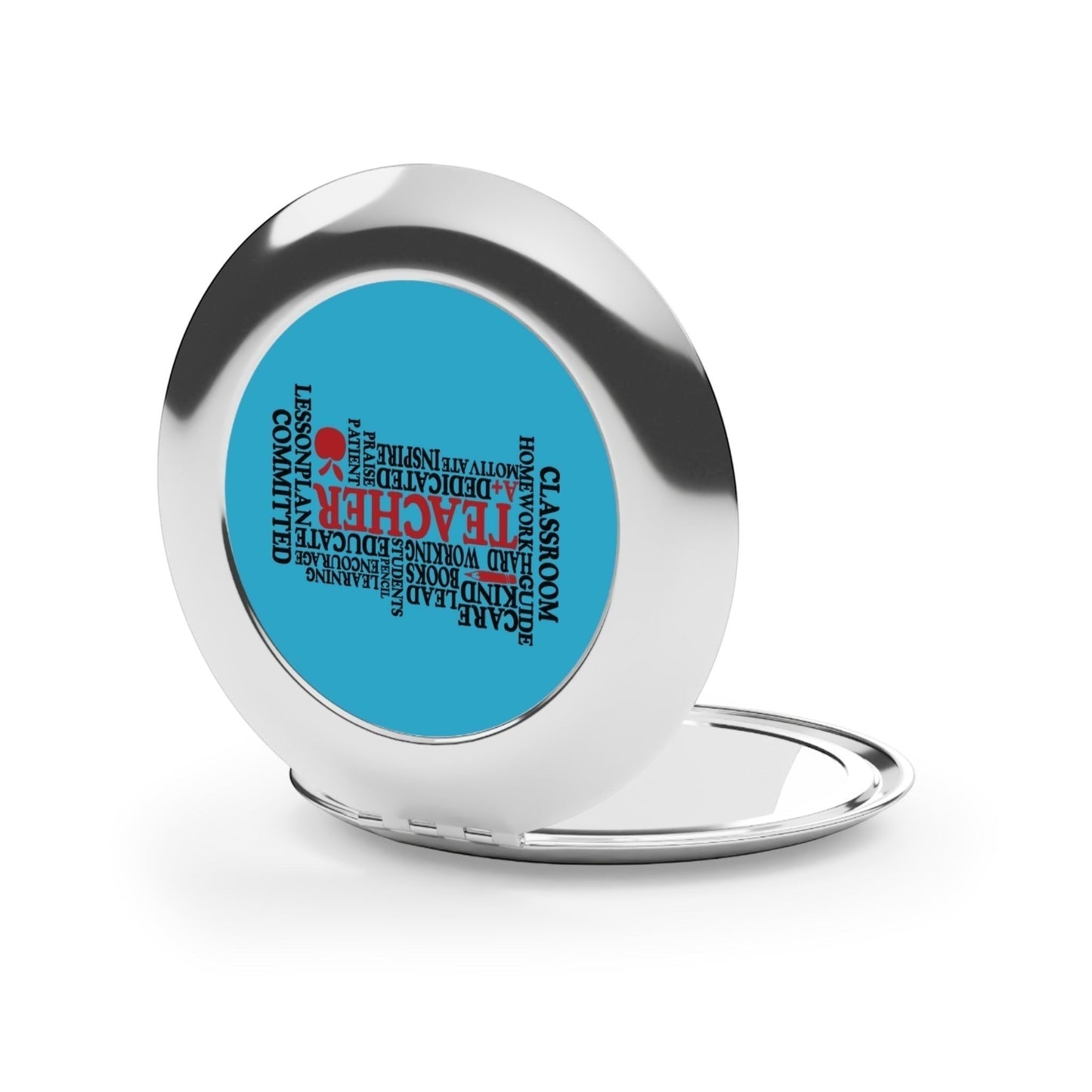 Compact travel mirror, open silver frame with blue word-collage insert