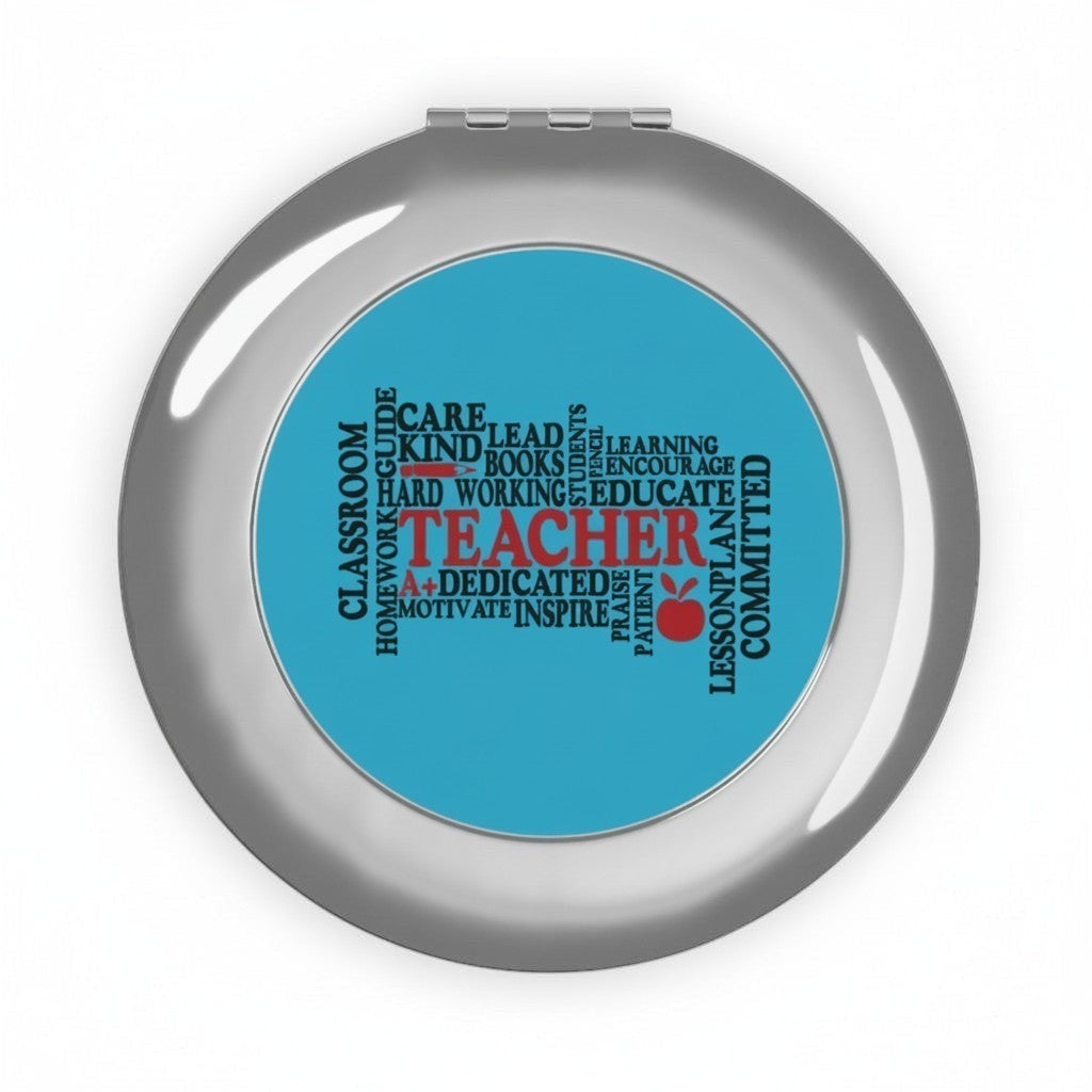 Compact travel mirror, silver glossy round case with blue word-collage insert