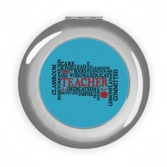 Compact travel mirror, silver glossy round case with blue word-collage insert