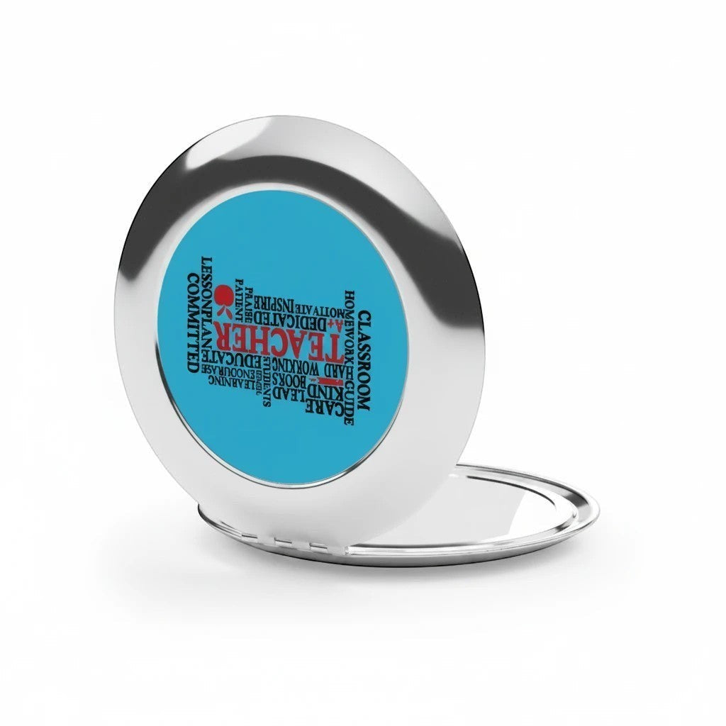 Compact travel mirror, open silver frame with blue word-collage insert