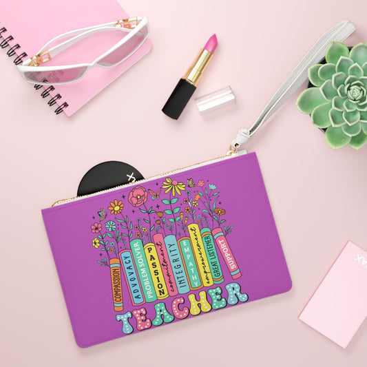 Purple teacher-themed clutch bag with gold zipper and white wrist strap