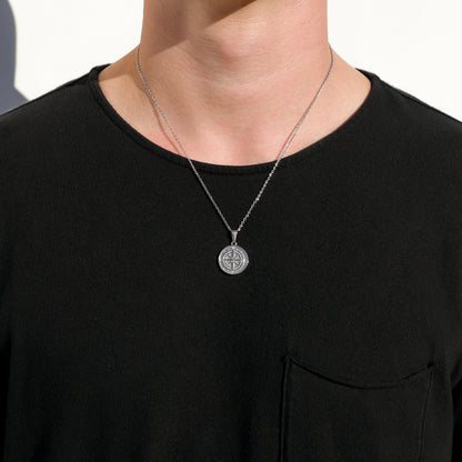 Silver compass pendant necklace set with two stacked round pendants and chain links