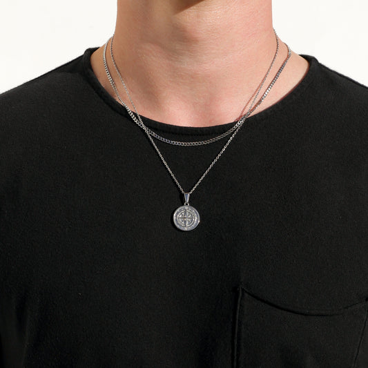 Silver compass pendant necklace set with two round pendants on chain collars