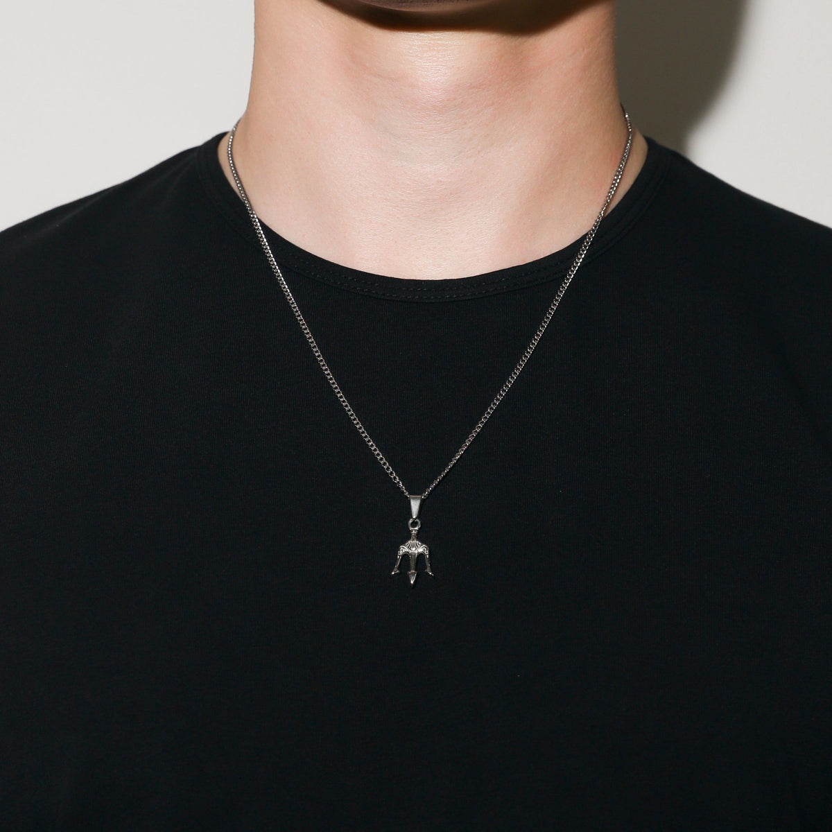 Silver-tone trident pendant necklace set with two layered chains