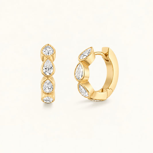 Gold marquise hoop earrings with three stacked clear stones, small hinged hoop