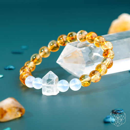 Golden beaded bracelet with amber and white stones, clear crystal center