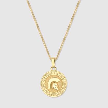 Gold Spartan warrior pendant necklace with round coin pendant and cable chain.