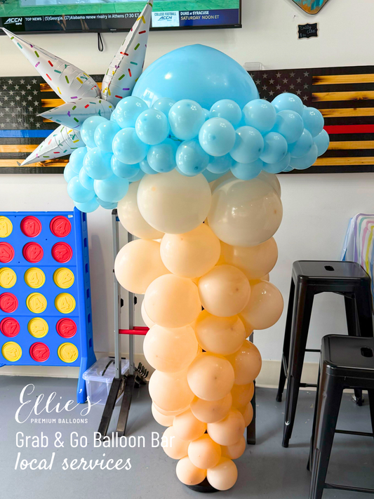 Starburst balloon cluster with blue and peach balloon spheres with confetti pattern