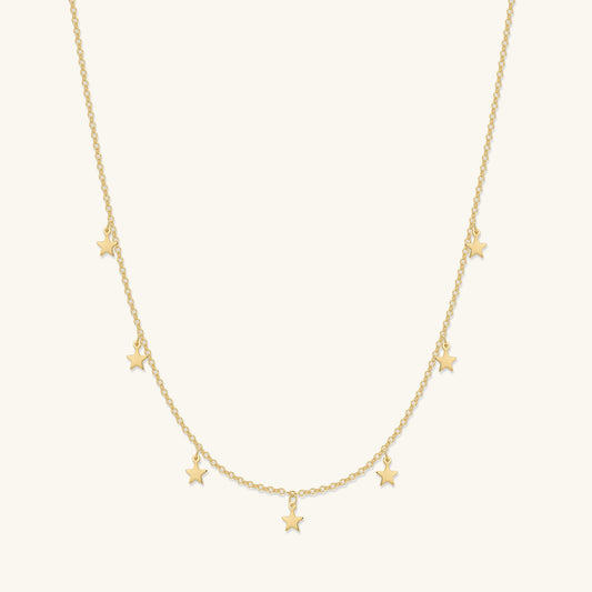 Gold star charm choker necklace with five dangling star pendants