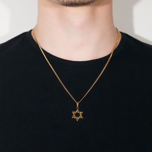 Gold Star of David pendant necklace with flat link chain, worn