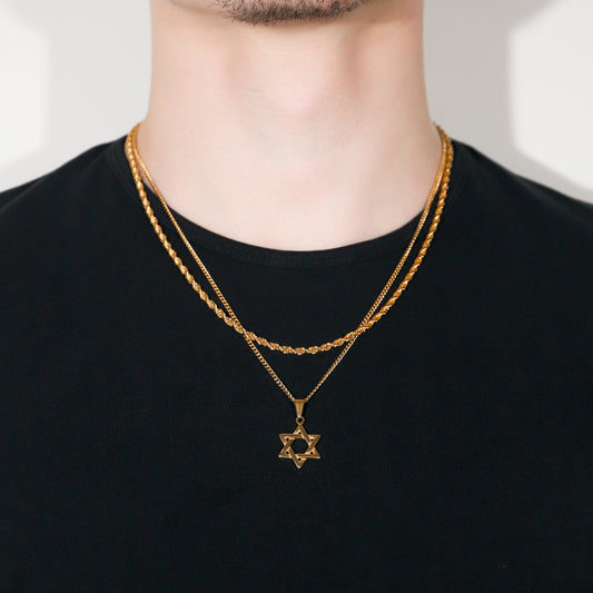 Gold Star of David pendant set with layered chains, worn on neckline