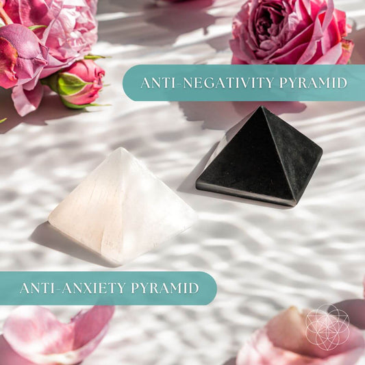 Stress-soothing pyramid set with black and light pyramids on soft fabric