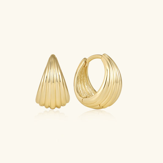 Gold sculpted hoop earrings with ridged taper design, shown front view