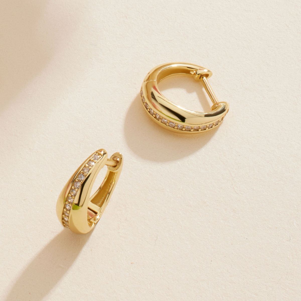 Gold teardrop diamond huggie hoop earrings