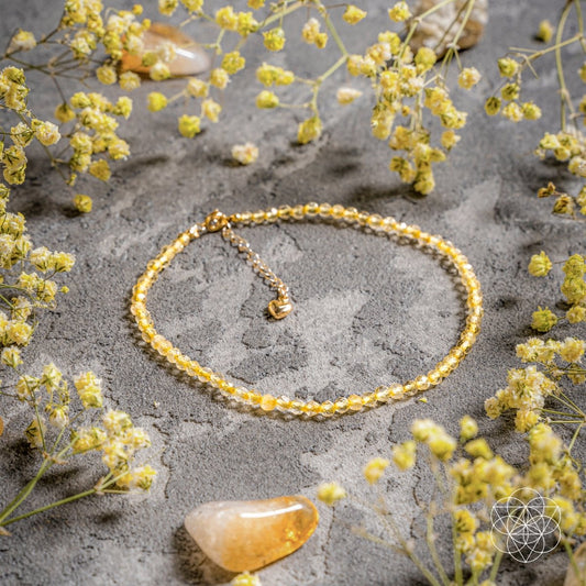 Gold beaded anklet with small heart charm and lobster clasp