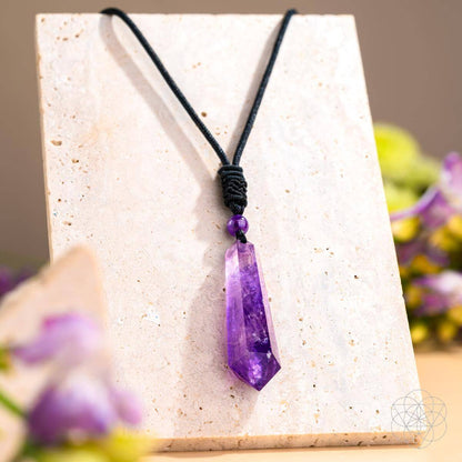Amethyst point pendant necklace on black braided cord