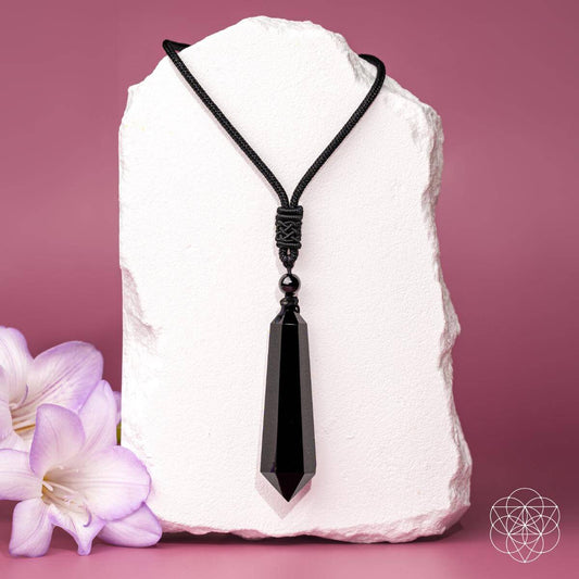 Black obsidian pendant necklace on a cord