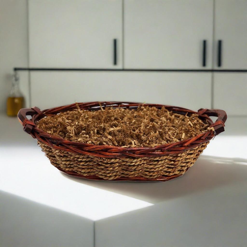 Wicker basket filled with shredded filler for Sympathy gift basket
