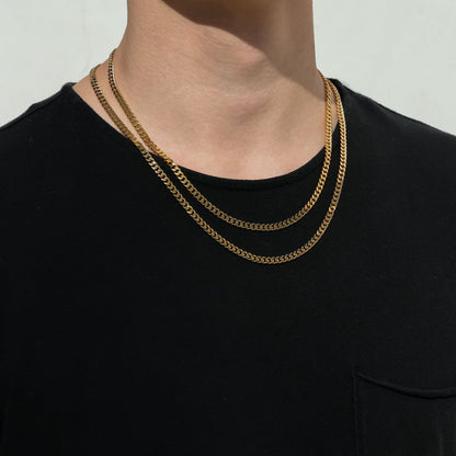 Gold Miami Cuban link chain necklace, 4.5 mm, 18K gold PVD, worn around neck