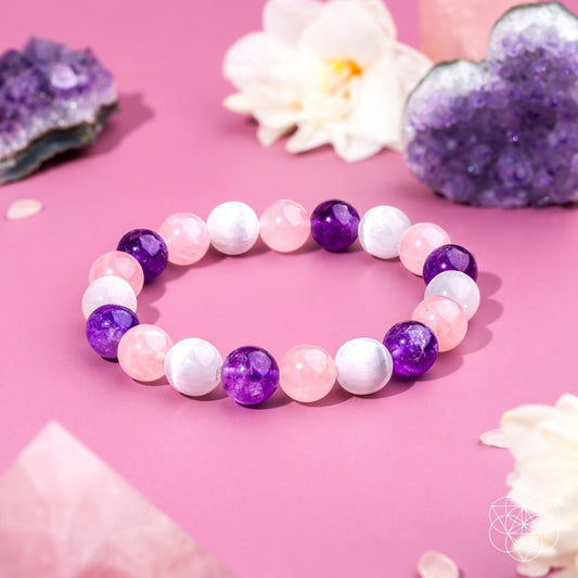 Beaded bracelet with pink, white, and purple round stones