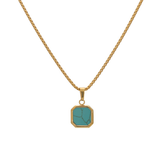 Gold-tone necklace with small turquoise square stone pendant on a chain