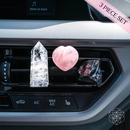 3-piece car dashboard freshener set with pink heart, clear crystal, and black pouch