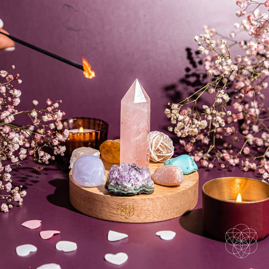 Turquoise-themed crystal lamp base with a lit candle and mixed crystal stones