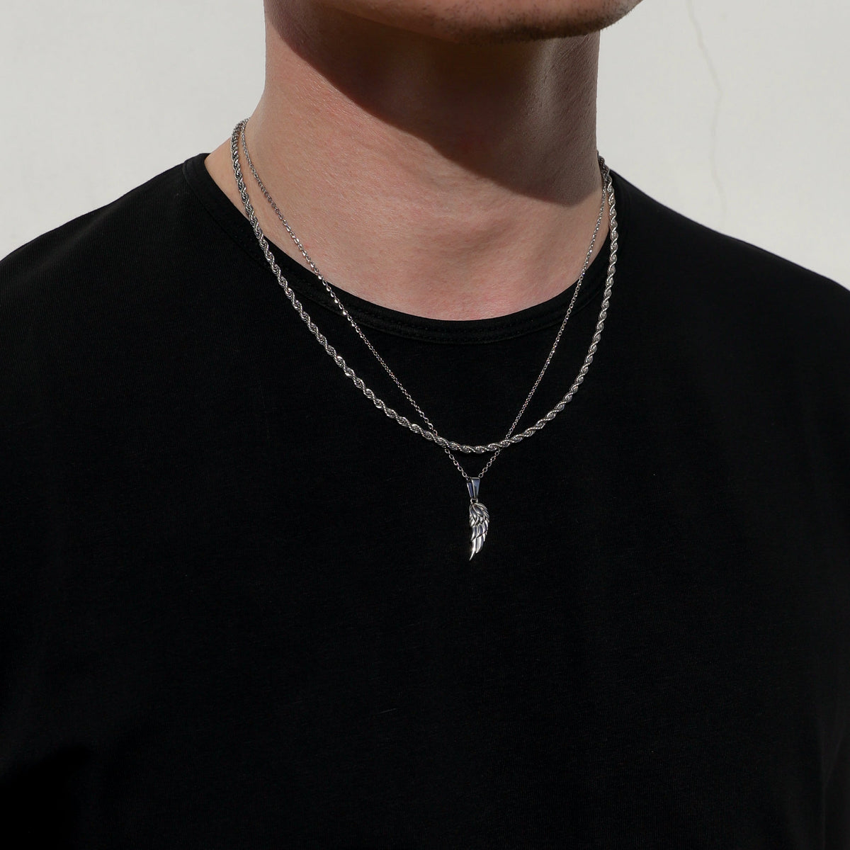 Silver angel wing pendant necklace set with slim twist rope chain