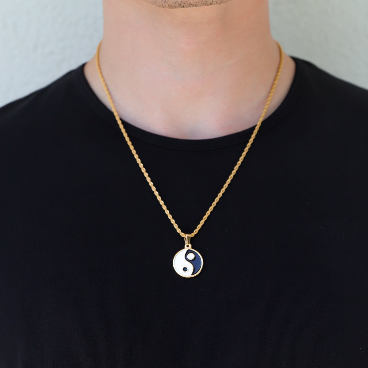 Gold chain necklace with yin yang enamel pendant, black and white round charm