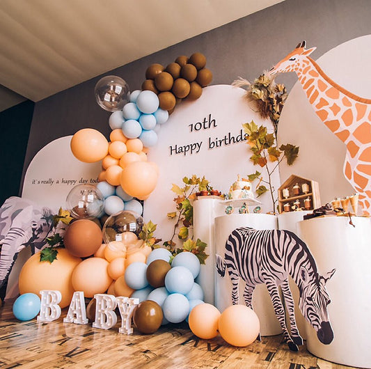 Giraffe safari balloon garland kit balloon arch with blue, mocha, and orange balloons and giraffe